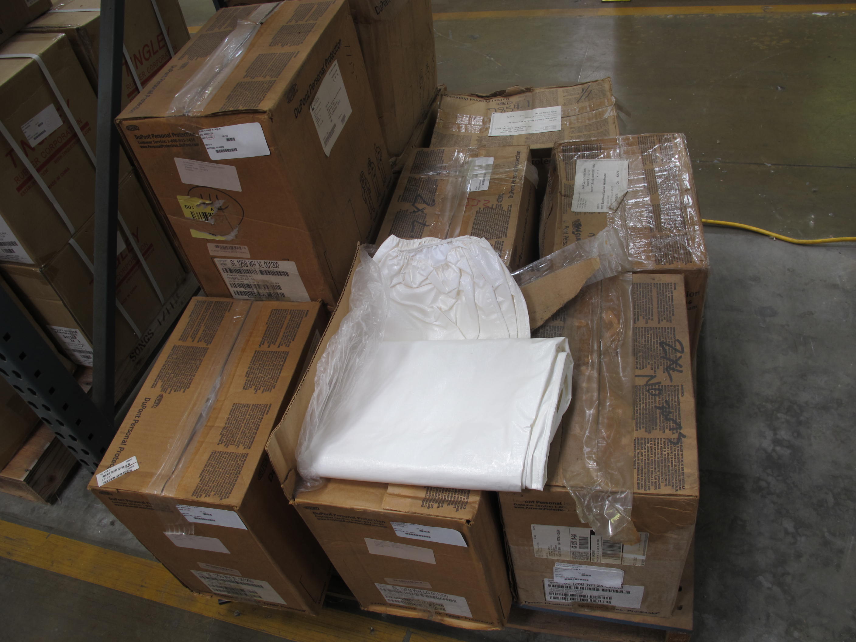 LOT TO INCLUDE: (7 CASES) COVERALLS, X-LARGE SIZE, TYCHEM SL MATERIAL, WHITE COLOR. COVERALL, COLLAR, ELASTIC WRISTS, ELASTIC ANKLES, FRONT ZIPPER CLOSURE, STORM FLAP OVER ZIPPER 12/CASE, (36) "COVERALL, XXL SIZE, HAZARDOUS MATERIAL/CHEMICAL PROTECTION KIND, SARANEX-LAMINATED TYVEK WITH NSR SEALED SEAMS MATERIAL, WHITE COLOR. ZIPPERED FRONT, ATTACHED HOOD AND BOOTS, AND ELASTIC WRISTS, NOT INCINERABLE, (100) COVERALL, LARGE SIZE, DISPOSABLE KIND, POLYPROPYLENE MATERIAL, BLUE COLOR. ZIPPER FRONT WITH OPEN SLEEVES AND ANKLES. 25 PER CASE. . LOADING & HANDLING FEE $15-4217